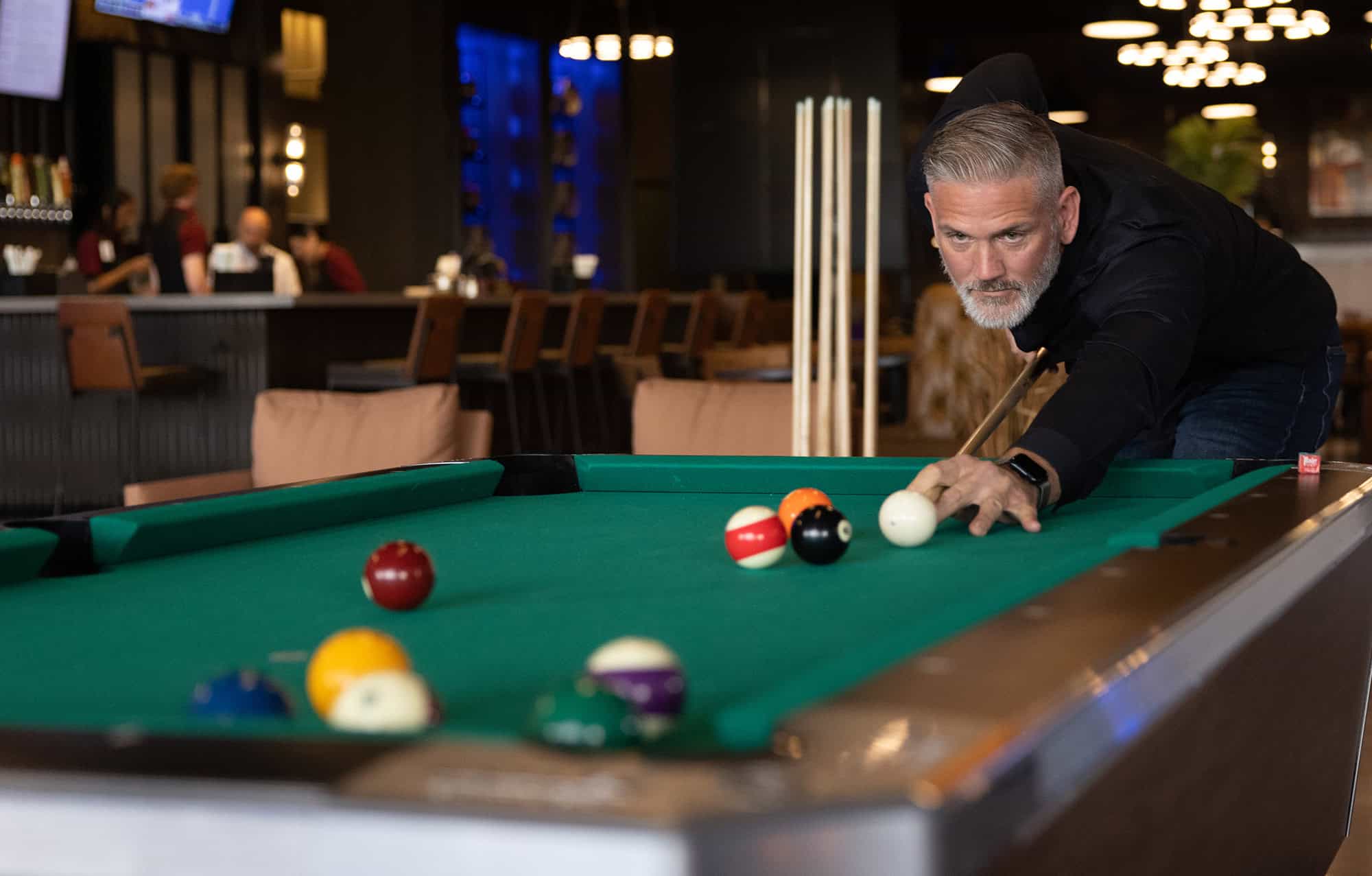 Pool game at Odawa Casino & Resort, featuring gaming entertainment and lively atmosphere.