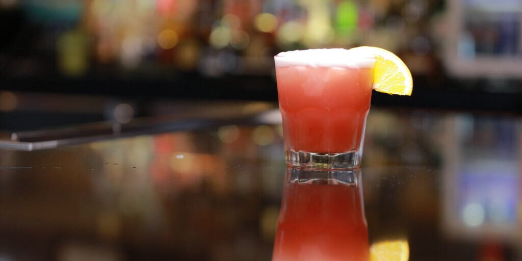 Refreshing cocktail with lemon wedge at Odawa Casino & Resort bar.