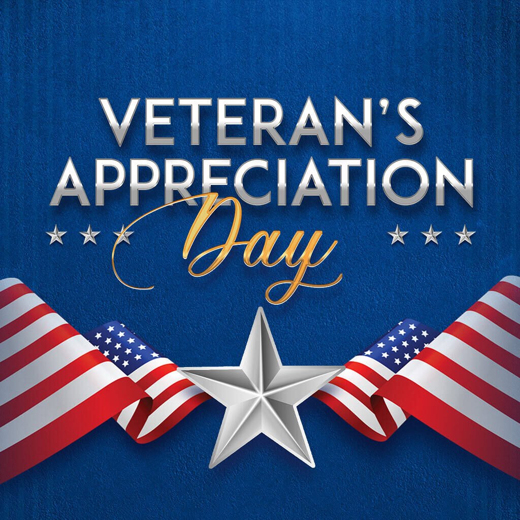 Patriotic theme for Veterans Appreciation Day at Odawa Casino & Resort with American flags and a star emblem.