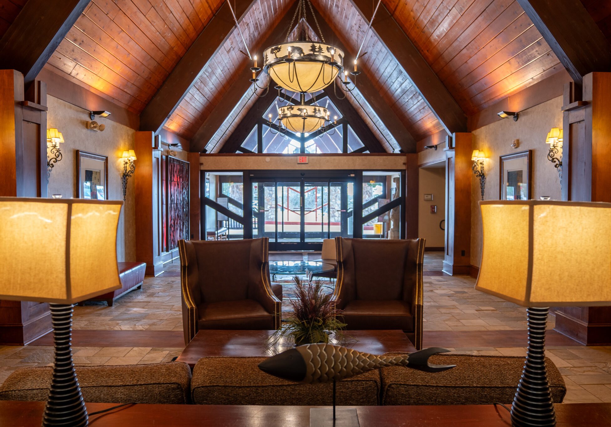 Elegant lodge lobby at Odawa Casino & Resort with wood accents and cozy seating.
