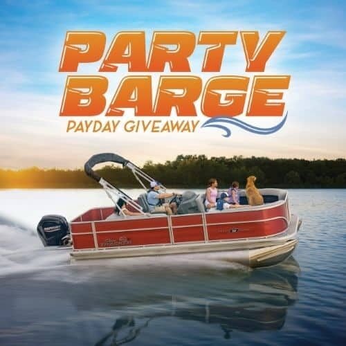 Party boat on the water with people enjoying a fun day at Odawa Casino & Resort.