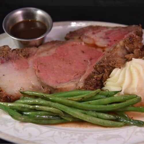 Juicy prime rib served with green beans, mashed potatoes, and au jus at Odawa Casino & Resort.