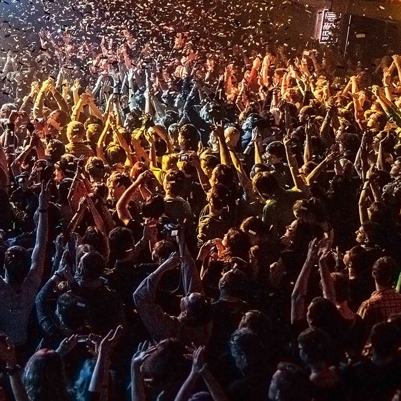 People enjoying live entertainment at Odawa Casino & Resort, celebrating and dancing in the lively atmosphere.