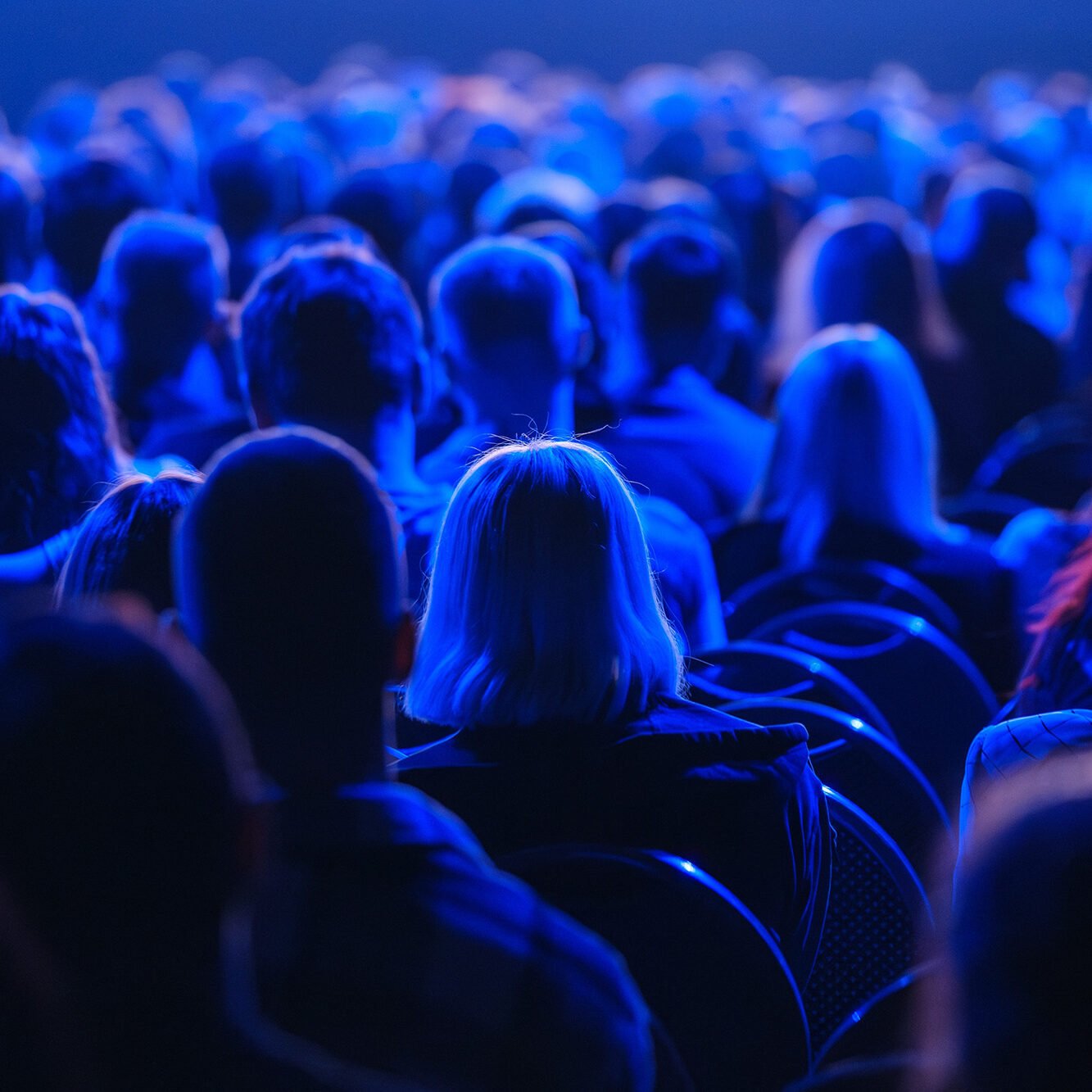 People attending a live event at Odawa Casino & Resort, enjoying entertainment in a vibrant atmosphere.