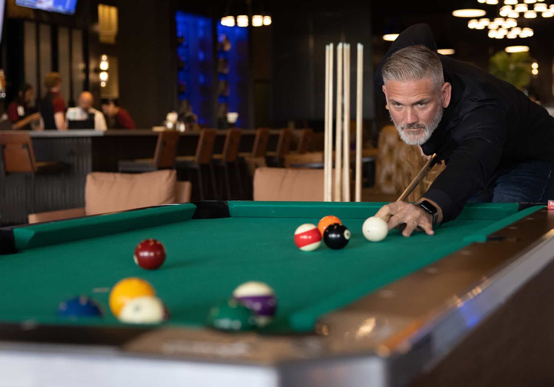 Pool game at Odawa Casino & Resort, featuring gaming entertainment and lively atmosphere.