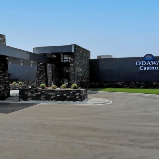 Modern Odawa Casino & Resort exterior with contemporary black stone design and welcoming entrance.