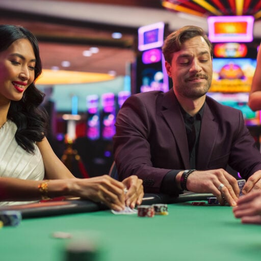 Exciting casino gaming at Odawa Casino & Resort with players enjoying poker and table games.