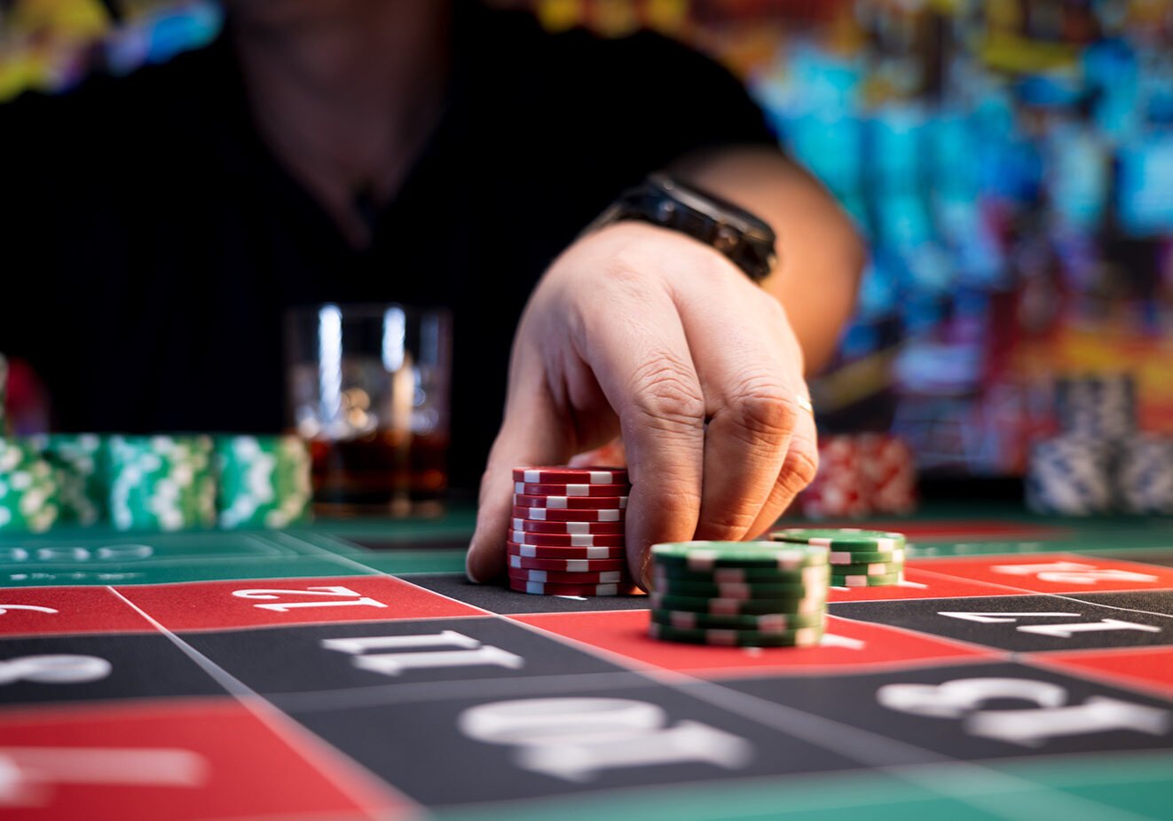 Stacks of poker chips on a gaming table at Odawa Casino & Resort.