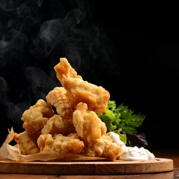 Crispy fried fish with fresh greens and dipping sauce at Odawa Casino resort.