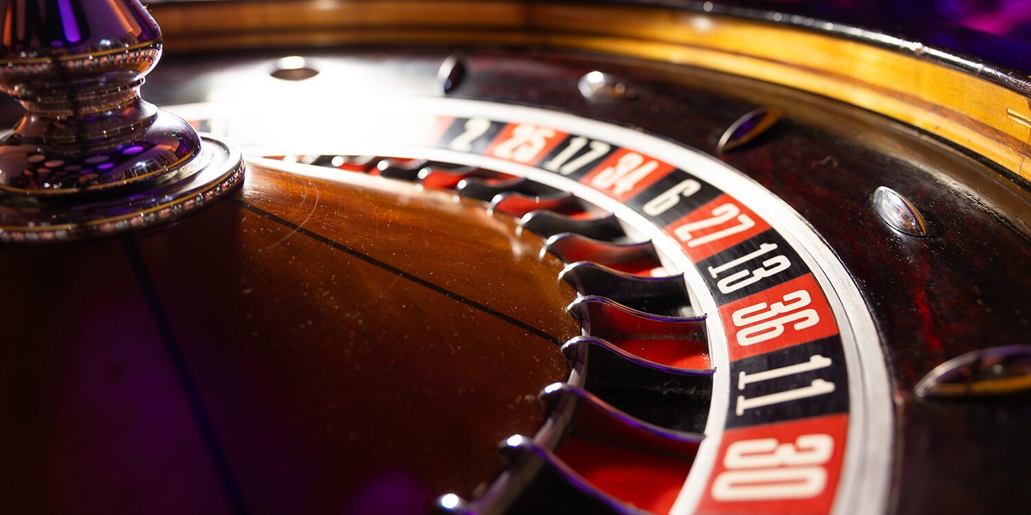 Betting wheel at Odawa Casino & Resort with vibrant lighting and casino gaming ambiance.